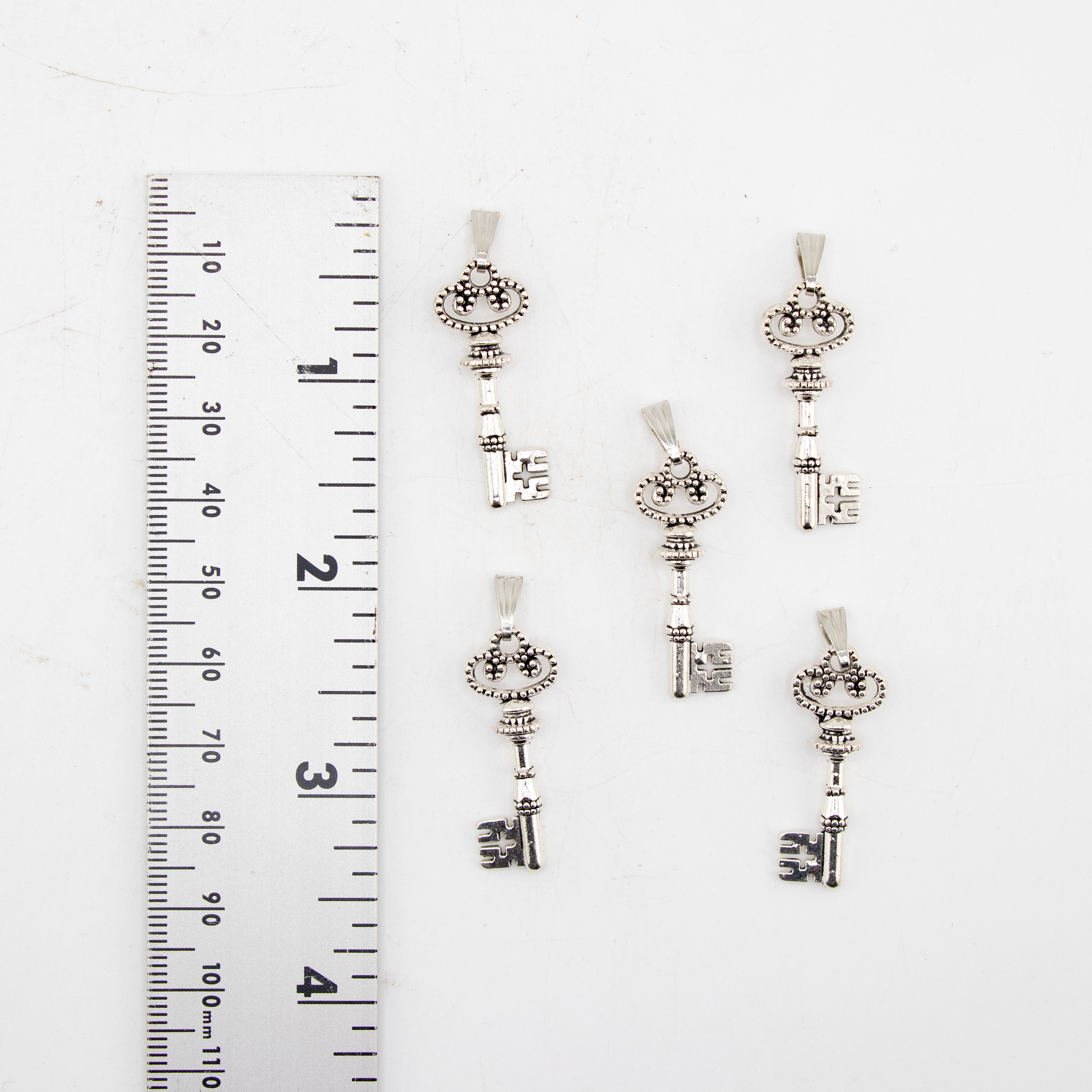 Regal Key Shaped Brass Pendant, 5 Pieces in a Pack