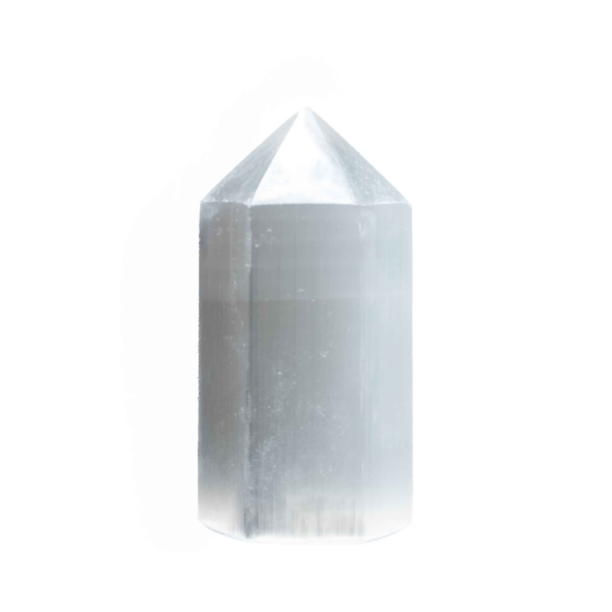 4-inch white selenite point tower crystal with polished faceted tip and natural fibrous texture on white background.