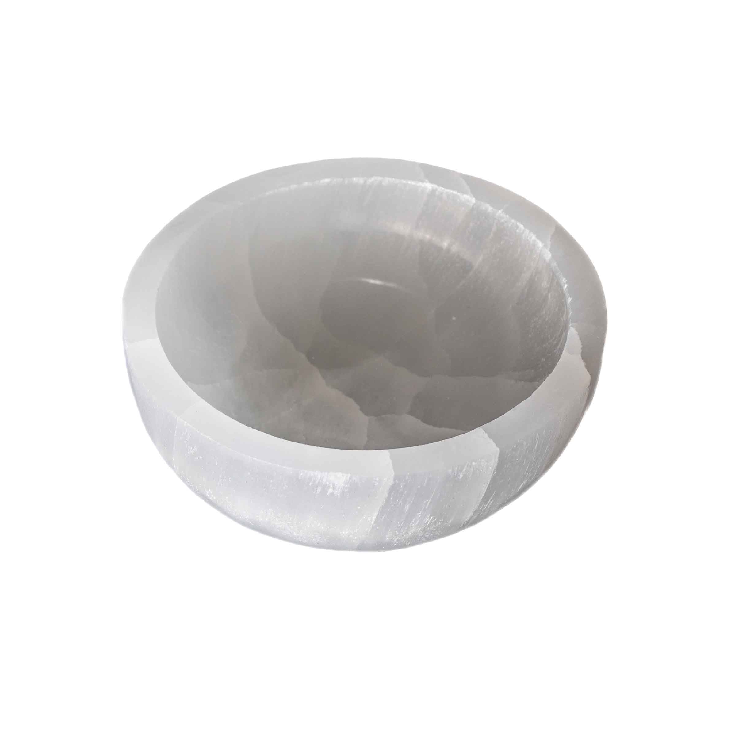 4-inch round white selenite crystal bowl with faceted exterior and natural fibrous texture on white background.